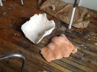 Freshly pulled plaster cast: cast and mother mold on studio floor